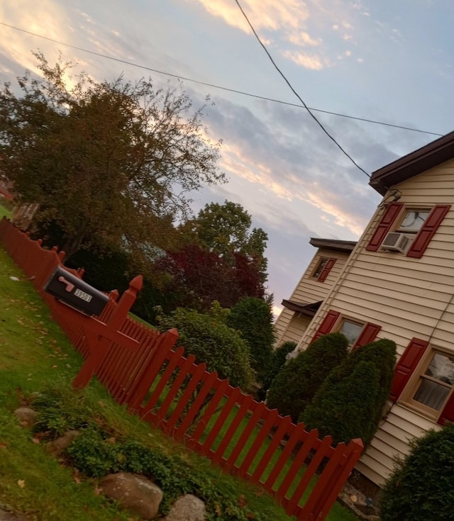 view of yard at dusk