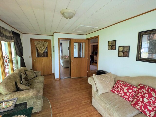39501 Centerville Rd, Centerville, PA 16404 - living area with wood finished floors and ornamental molding