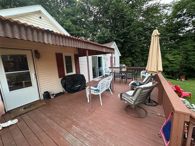 wooden deck featuring grilling area