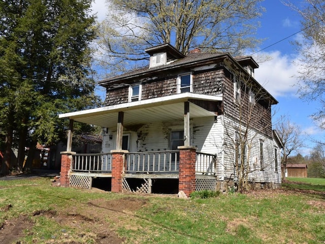 24988 State St, Meadville, PA 16335 - view of home's exterior with covered porch and a yard