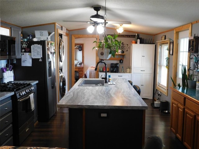 234 Shawnee Ave, Corry, PA 16407 - kitchen featuring gas stove, a sink, a ceiling fan, dark wood-style floors, and crown molding