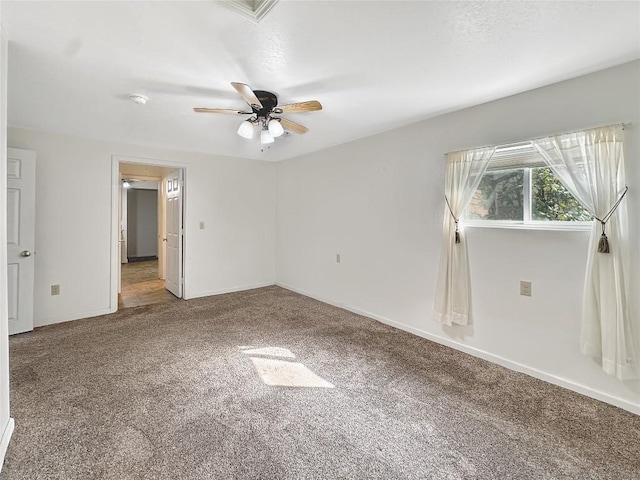 unfurnished bedroom featuring baseboards, carpet flooring, and ceiling fan