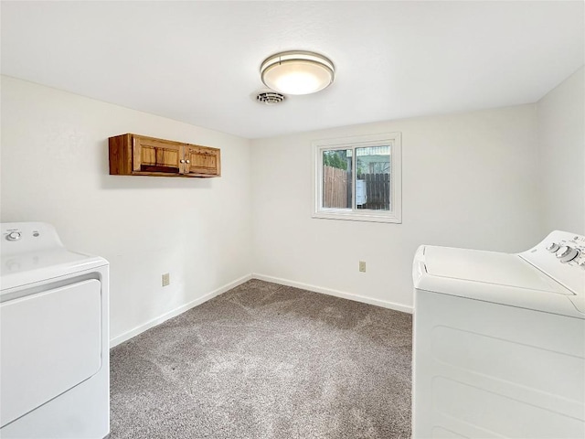 laundry room featuring carpet, visible vents, independent washer and dryer, and laundry area
