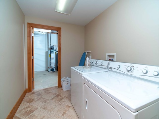 laundry room featuring washer and clothes dryer and gas water heater