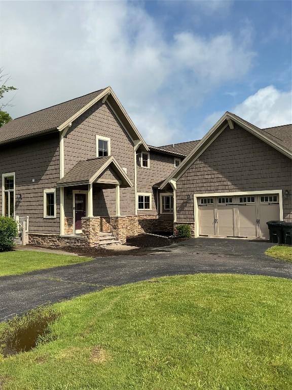 8516 Ridgeview Rd Unit 8516, Clymer, NY 14724 - view of front of house featuring asphalt driveway, a front yard, and an attached garage