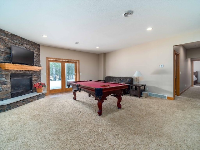 playroom featuring pool table, a fireplace, and carpet flooring