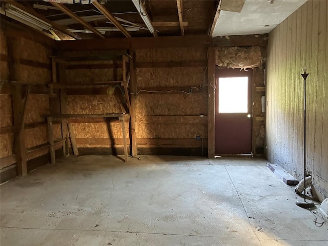 misc room with a garage