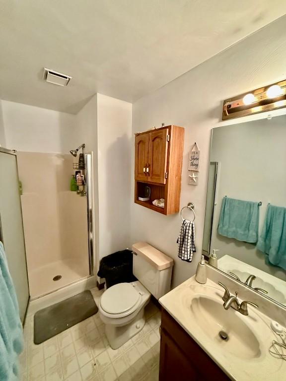 2735 W 35th St, Erie, PA 16506 - full bathroom featuring vanity and a stall shower