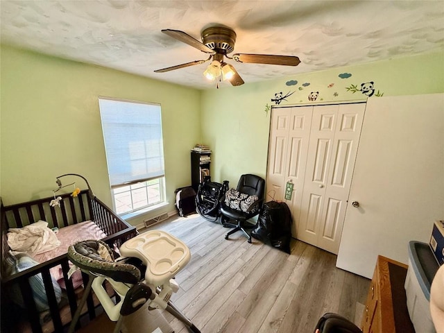 2735 W 35th St, Erie, PA 16506 - bedroom featuring wood finished floors, a closet, and ceiling fan