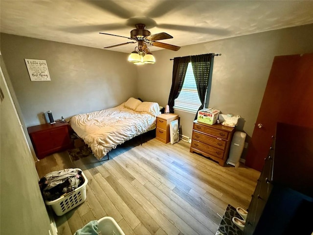 2735 W 35th St, Erie, PA 16506 - bedroom with wood finished floors and a ceiling fan