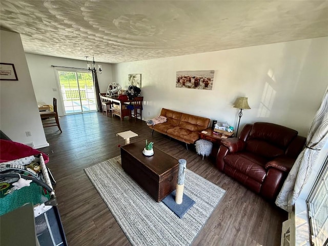 2735 W 35th St, Erie, PA 16506 - living room with a chandelier and dark wood-style floors