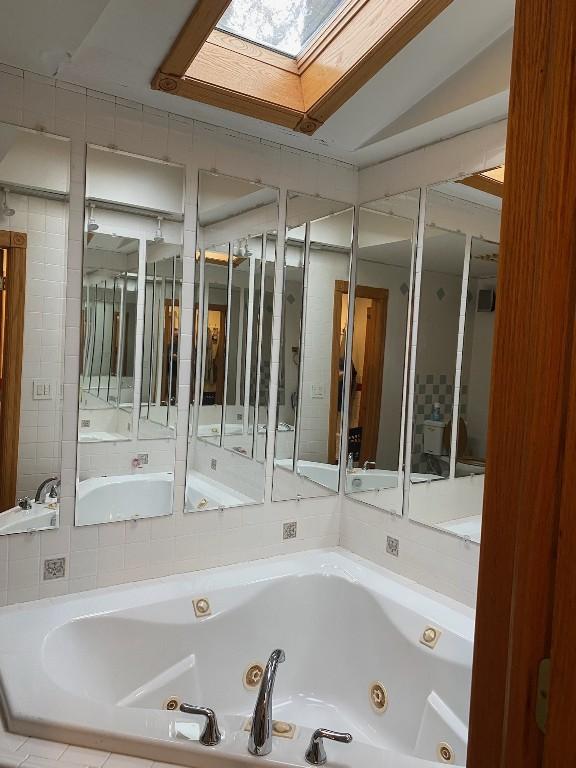 1813 Myrtle St, Erie, PA 16502 - full bath featuring a skylight and a jetted tub