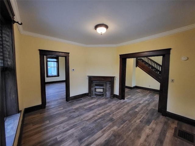 1038 Liberty St, Meadville City, PA 16335 - unfurnished living room featuring ornamental molding, dark wood-style flooring, and baseboards