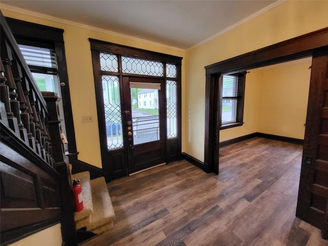 1038 Liberty St, Meadville City, PA 16335 - entrance foyer with crown molding, stairs, plenty of natural light, and baseboards