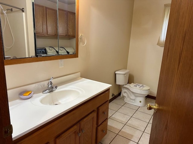 1429 Quick Dr, Espyville, PA 16424 - bathroom featuring vanity, tile patterned floors, toilet, and baseboards
