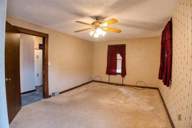 1219 W 32nd St, Erie, PA 16508 - carpeted empty room featuring ceiling fan and a textured ceiling
