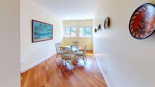 dining room featuring light hardwood / wood-style flooring