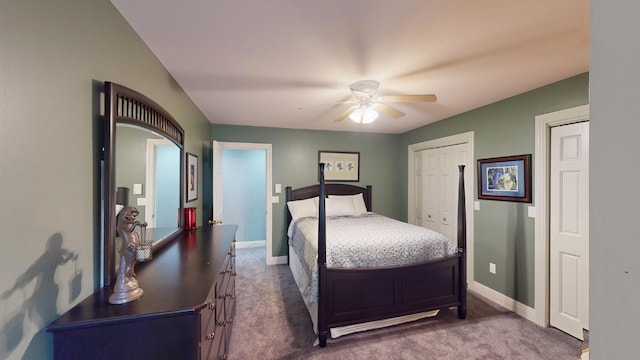 bedroom with ceiling fan and dark carpet