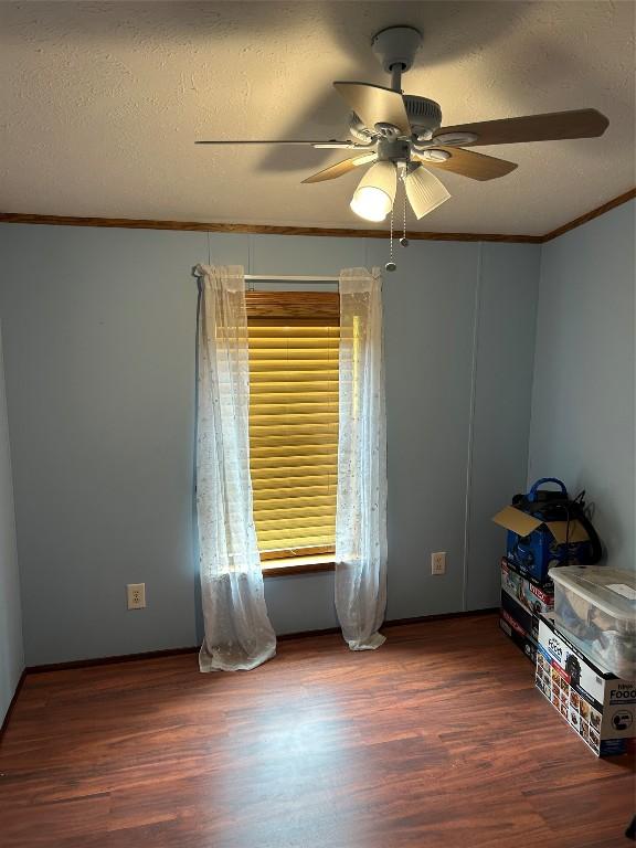 263 W Jamestown Rd, Jamestown, PA 16134 - unfurnished room with wood finished floors, ceiling fan, crown molding, and a textured ceiling