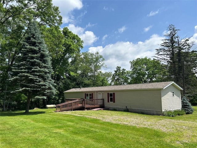 263 W Jamestown Rd, Jamestown, PA 16134 - back of property featuring a deck and a yard