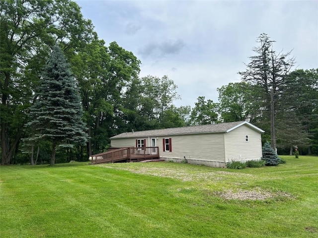 263 W Jamestown Rd, Jamestown, PA 16134 - back of property featuring a deck and a lawn