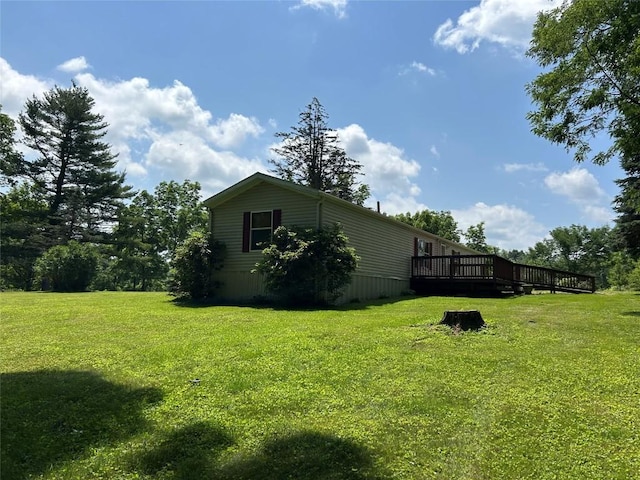 263 W Jamestown Rd, Jamestown, PA 16134 - view of side of home with a wooden deck and a yard