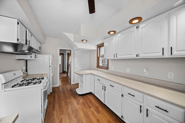 kitchen featuring ceiling fan, white range with gas cooktop, white cabinets, and light wood-type flooring