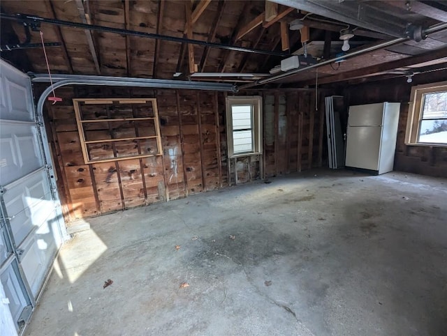 garage with white fridge