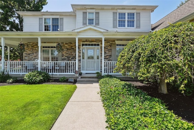 6262 Cobblestone Dr, Millcreek, PA 16509 - view of front of property with covered porch and a front lawn