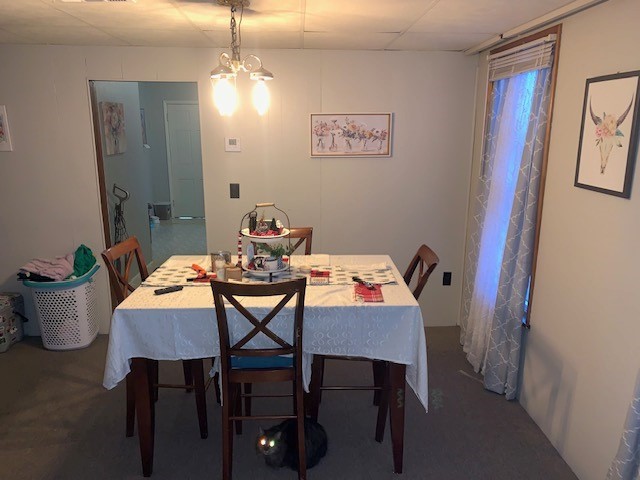 dining room featuring an inviting chandelier