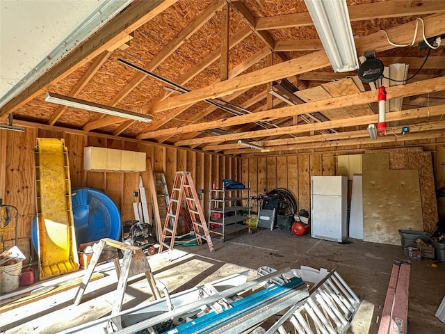 garage with freestanding refrigerator