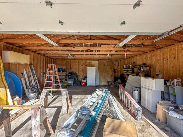 garage with freestanding refrigerator