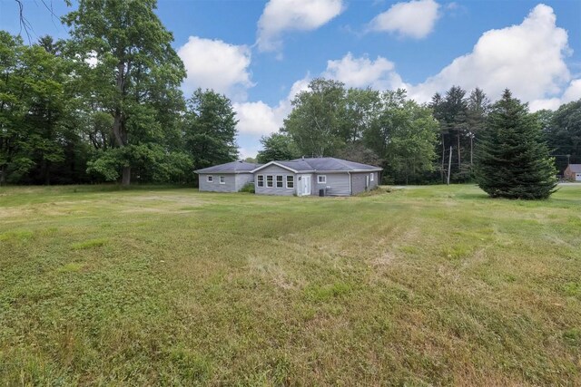10220 Barton Rd, Waterford, PA 16441 - view of grassy yard with a garage