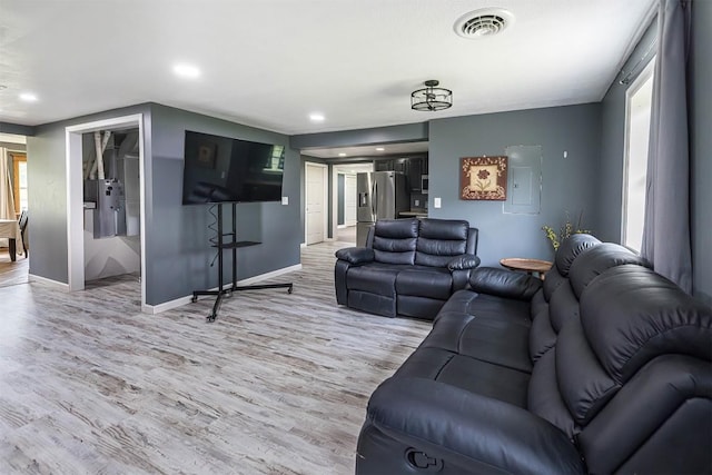 10220 Barton Rd, Waterford, PA 16441 - living room with light wood finished floors, electric panel, and recessed lighting