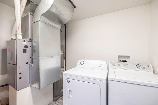 10220 Barton Rd, Waterford, PA 16441 - laundry area with washing machine and clothes dryer