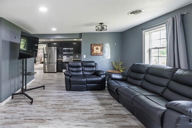 10220 Barton Rd, Waterford, PA 16441 - living area with light wood-type flooring and recessed lighting