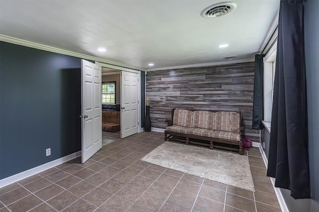 10220 Barton Rd, Waterford, PA 16441 - living area with an accent wall, crown molding, recessed lighting, and dark tile patterned floors