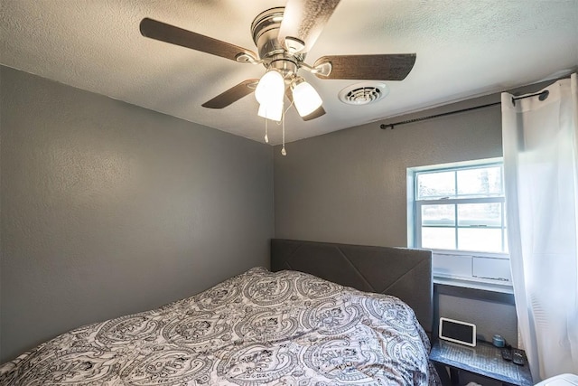 10220 Barton Rd, Waterford, PA 16441 - bedroom featuring a textured wall, a textured ceiling, and a ceiling fan