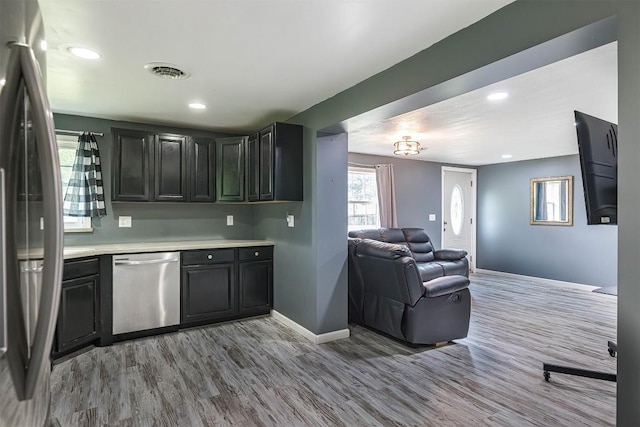 10220 Barton Rd, Waterford, PA 16441 - bar with stainless steel appliances, light wood-style floors, and recessed lighting