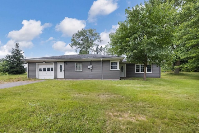 10220 Barton Rd, Waterford, PA 16441 - ranch-style home featuring an attached garage, asphalt driveway, and a front yard