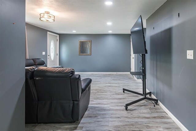 10220 Barton Rd, Waterford, PA 16441 - living area with wood finished floors and recessed lighting