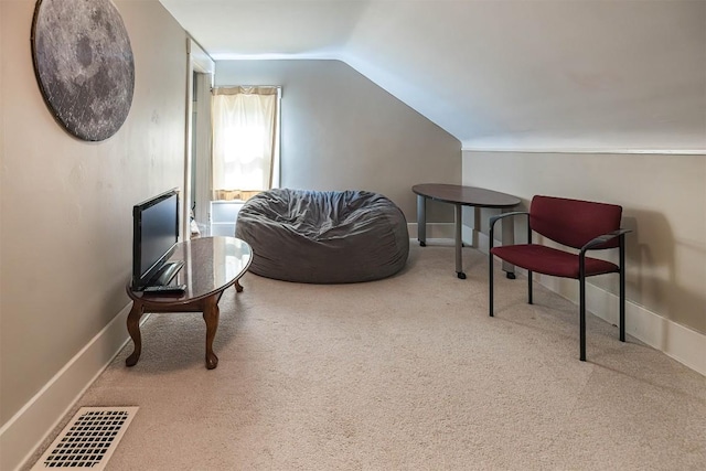 1047 Napier Ave, Erie, PA 16511 - living area featuring carpet floors, vaulted ceiling, and baseboards