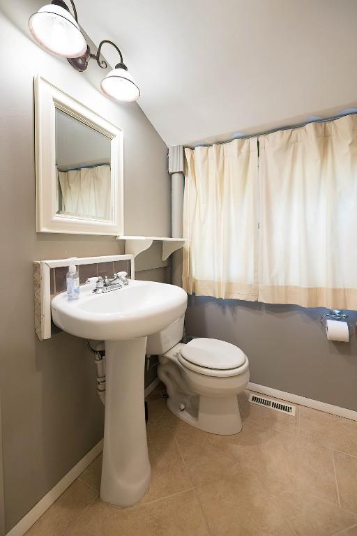 1047 Napier Ave, Erie, PA 16511 - bathroom with tile patterned flooring and toilet