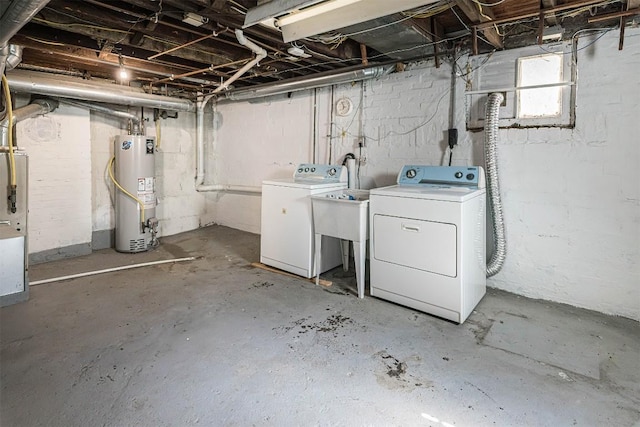 1047 Napier Ave, Erie, PA 16511 - below grade area featuring water heater and washer and clothes dryer