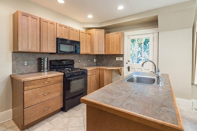 1047 Napier Ave, Erie, PA 16511 - kitchen with black appliances, a sink, tasteful backsplash, baseboards, and light brown cabinetry