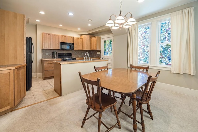 1047 Napier Ave, Erie, PA 16511 - dining area with baseboards, recessed lighting, and light carpet