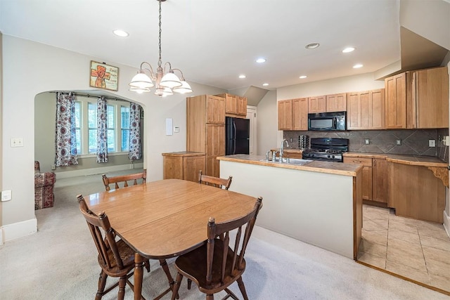 1047 Napier Ave, Erie, PA 16511 - dining area with recessed lighting, a chandelier, and light colored carpet