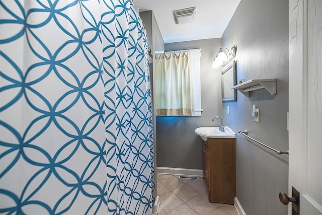 1047 Napier Ave, Erie, PA 16511 - full bath featuring vanity, tile patterned flooring, baseboards, and curtained shower