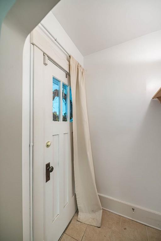 1047 Napier Ave, Erie, PA 16511 - entryway with light tile patterned flooring and baseboards