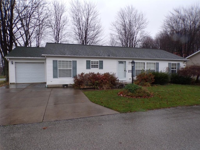 single story home featuring a front lawn and a garage